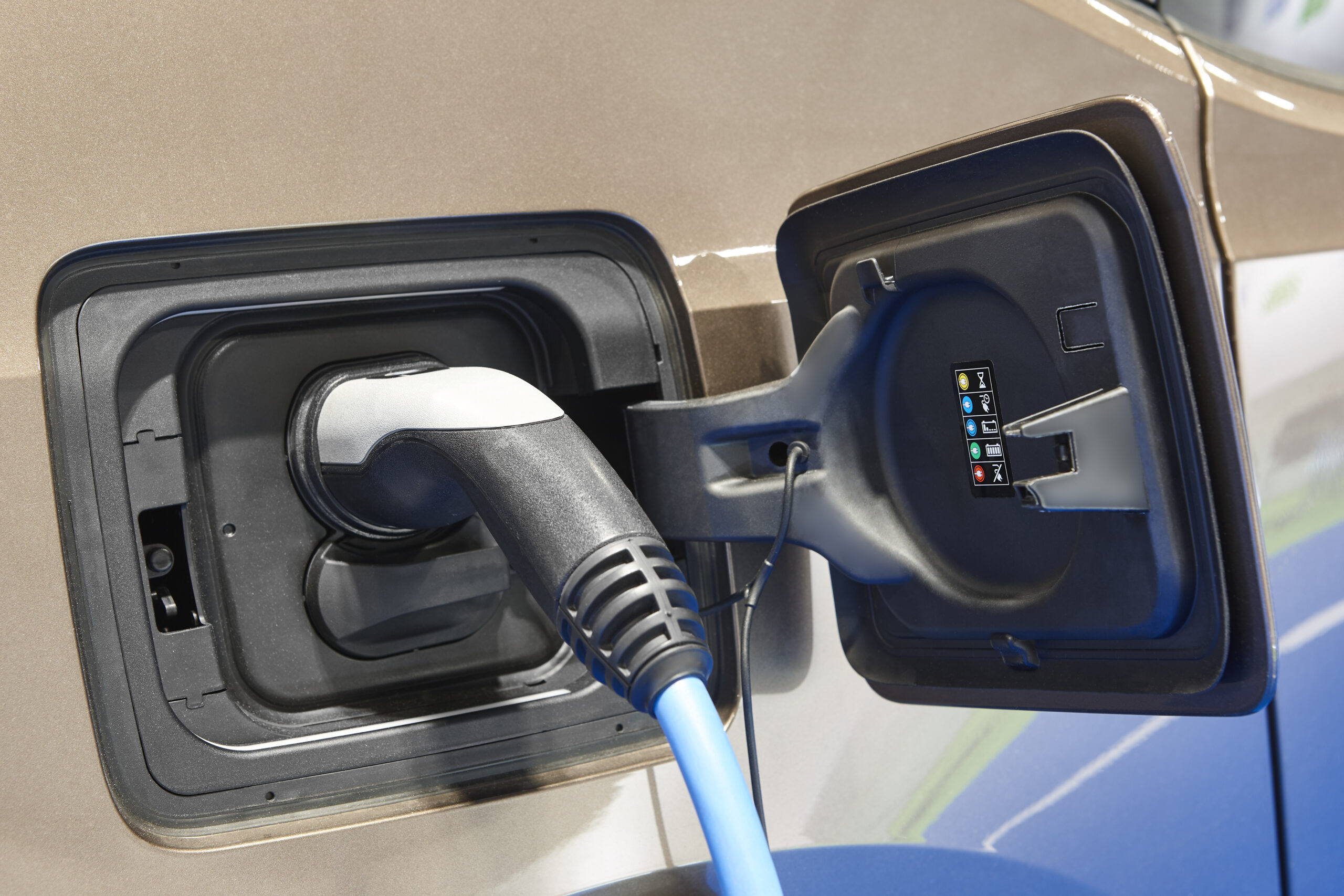 Electric car plug socket power charger. Renewable clean energy. Eco